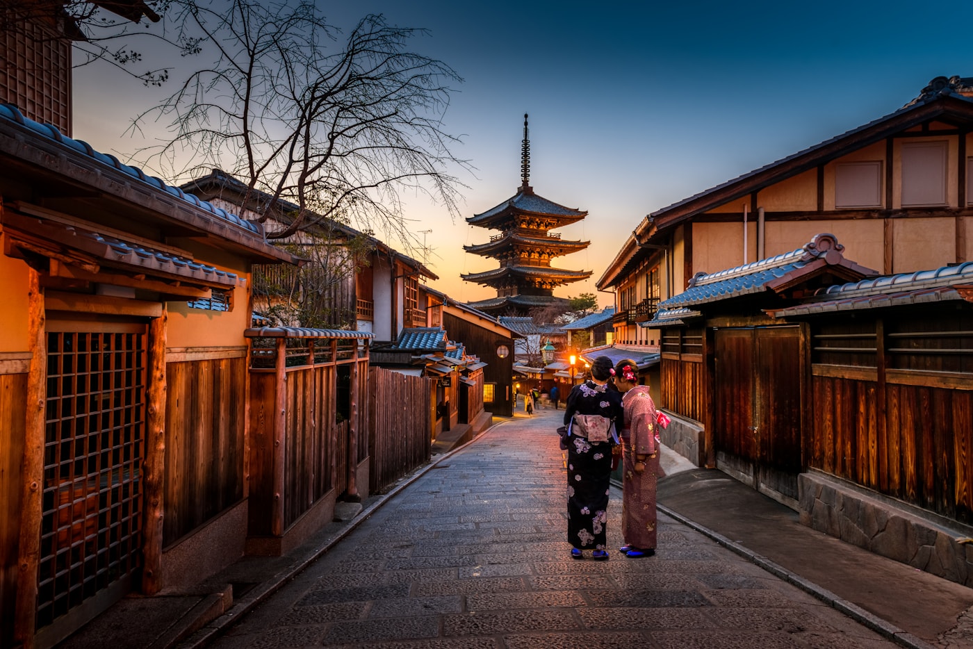 Traditional Kyoto street and pagoda at dusk